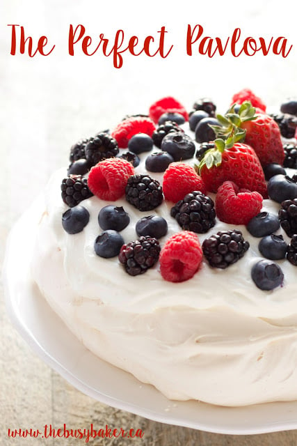 The Perfect Pavlova recipe makes a delicious and showstopping easy-to-make gluten-free dessert that's also on the healthier side! Recipe from thebusybaker.ca!