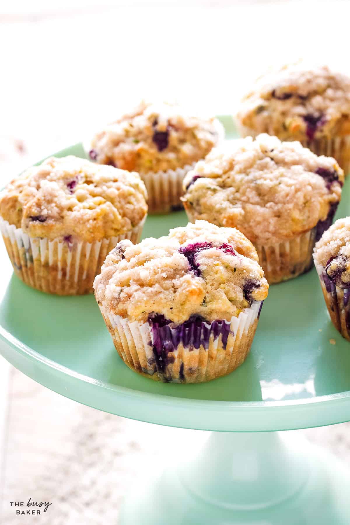 turquoise platter with blueberry zucchini muffins
