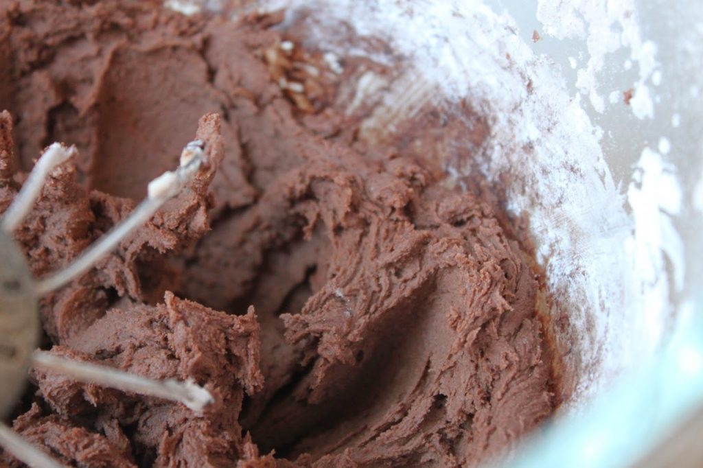 making dark chocolate frosting in a stand mixer