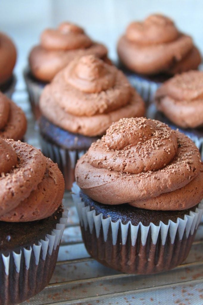 moist chocolate cupcakes topped with fluffy chocolate buttercream