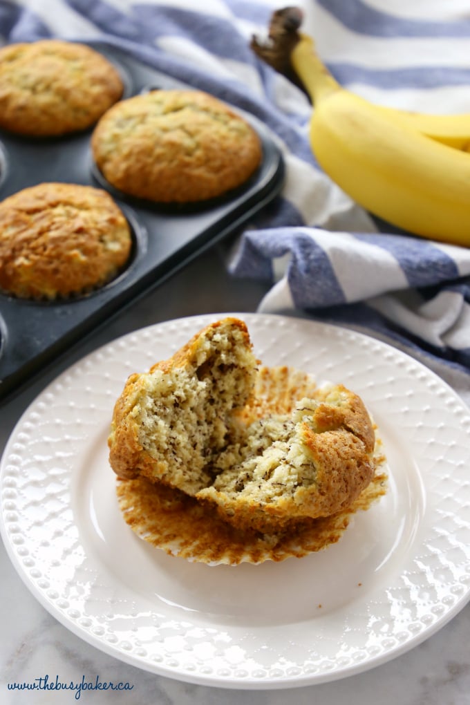 These Best Ever Banana Muffins are the best banana muffins you'll ever try - crispy on the outside and fluffy on the inside! And so easy to make in only one bowl! Ready in minutes! Recipe from thebusybaker.ca! #besteverbananamuffins #bestbananamuffins #bananamuffins #easymuffinrecipe