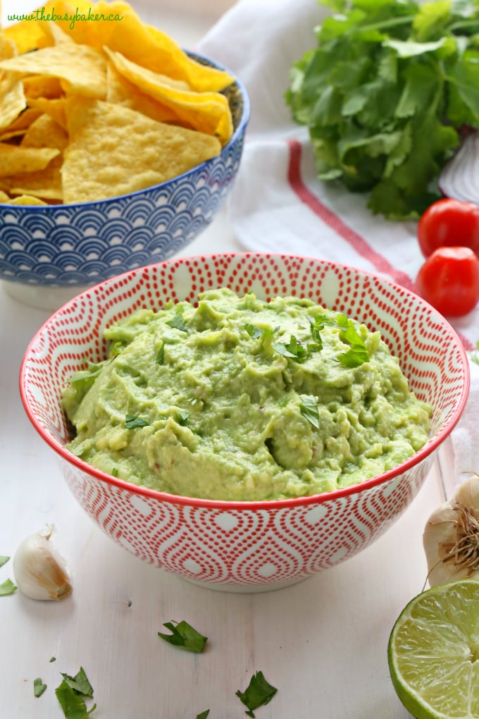 easy Guacamole in Red and White Bowl with chips