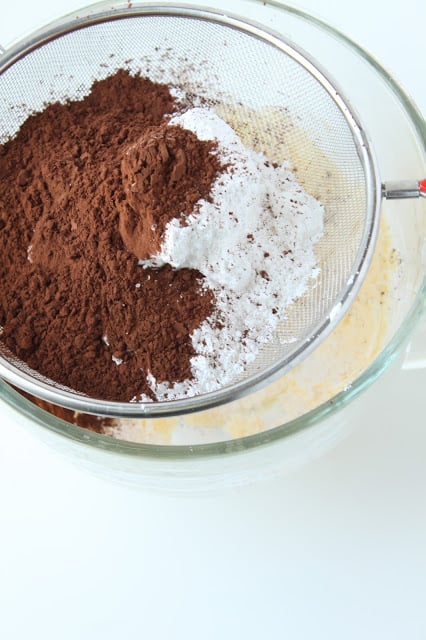 bowl with dry ingredients to make a chocolate layer cake