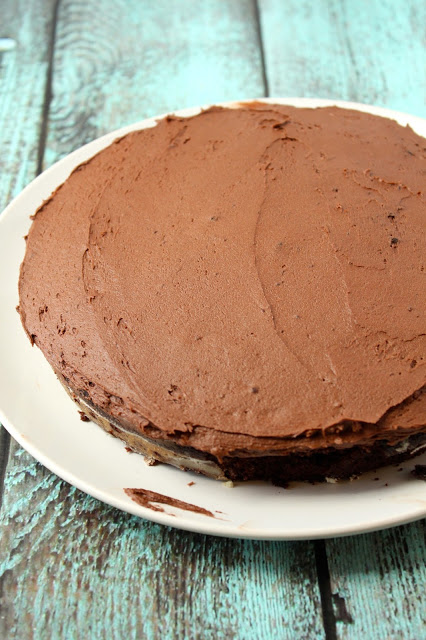 assembling a chocolate layer cake