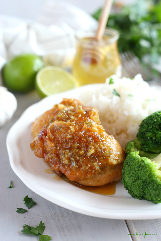 This Honey Garlic Lime Chicken is an easy weeknight meal recipe featuring tender chicken thighs cooked in a sweet lime and garlic sauce! Just a few simple ingredients and you're on your way to a delicious family meal that's so easy to make! Recipe from thebusybaker.ca! #easyhoneygarlicchicken #easychickenrecipe #honeygarlicsauce