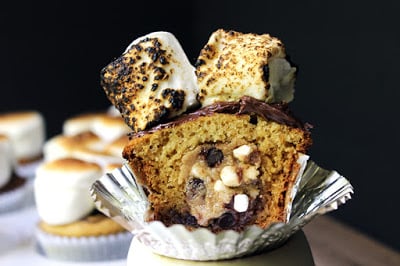 http://dinnerthendessert.com/graham-cracker-cupcakes-filled-with-smores-cookie-dough/
