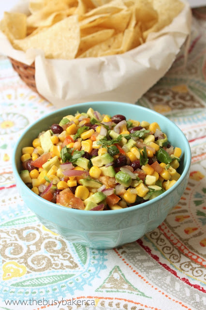 bowl of black bean salsa with corn and avocado