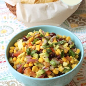 bowl of black bean salsa with corn and avocado