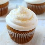 pumpkin spice cupcakes topped with cream cheese frosting