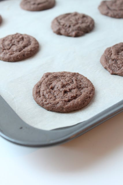 baked peanut butter chocolate cookies on a baking sheet