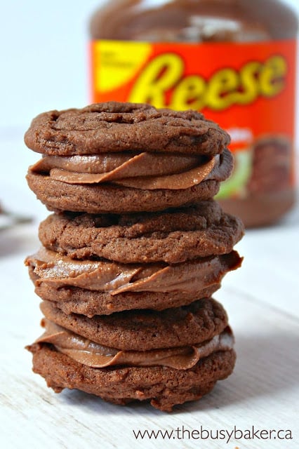 3 homemade sandwich cookies made with Reese's chocolate peanut butter spread