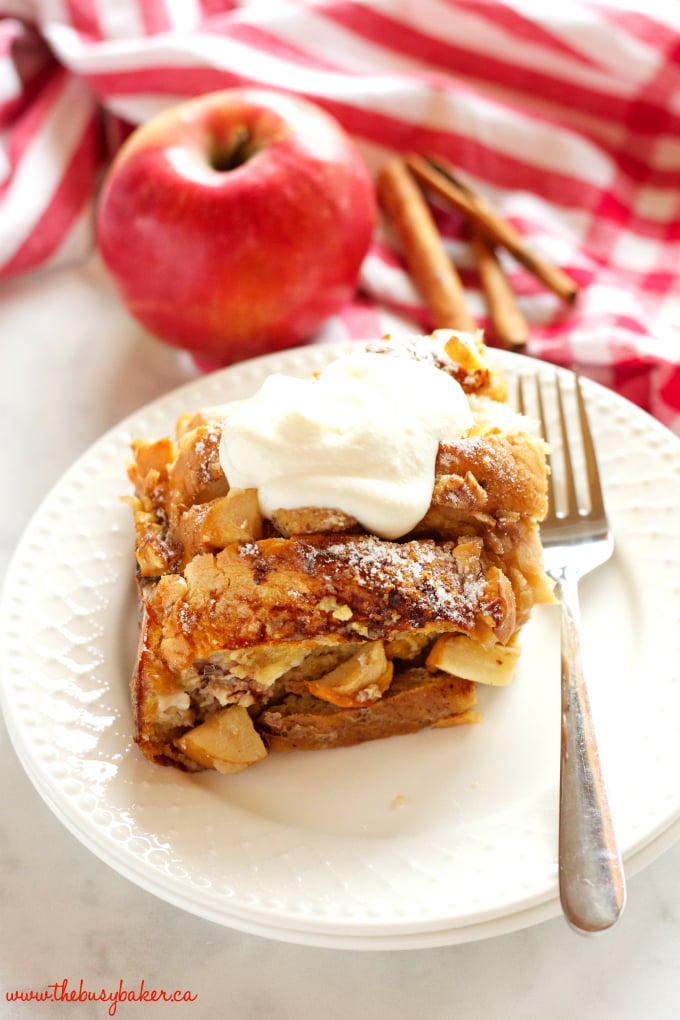 This Apple Cinnamon French Toast Casserole is the perfect holiday breakfast entertaining recipe made with fresh apples, pecans, and served with maple syrup! Recipe from thebusybaker.ca! #holidaybreakfastrecipe #holidayrecipe 