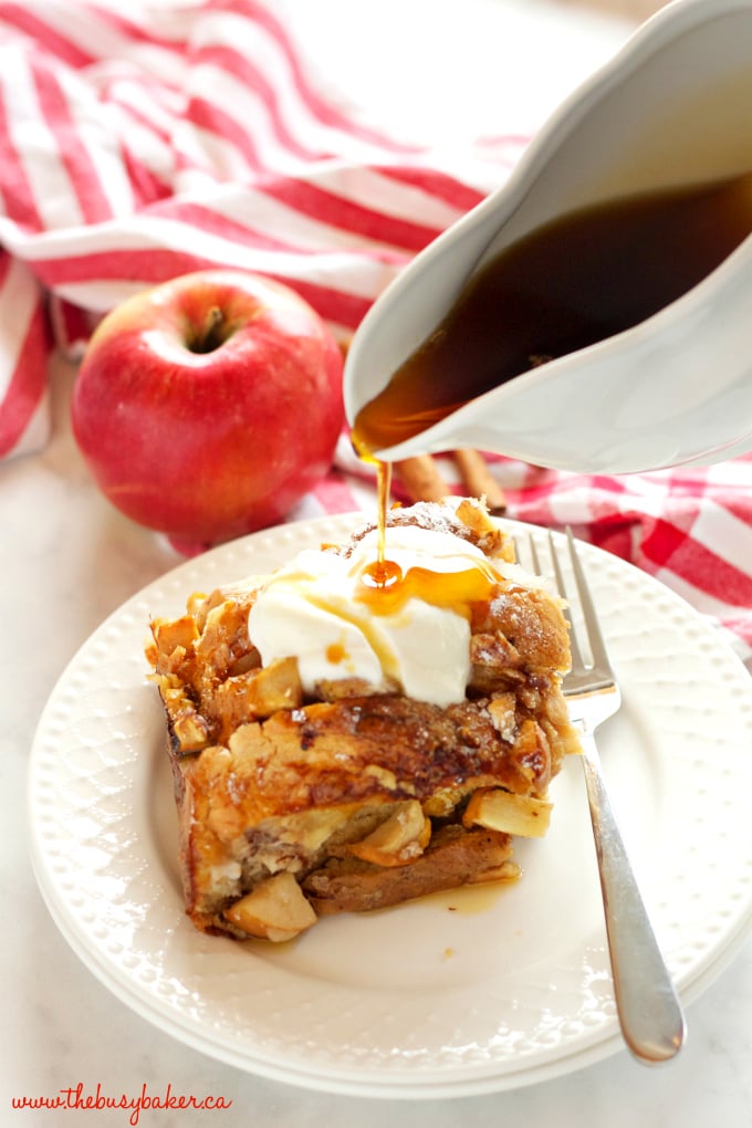 This Apple Cinnamon French Toast Casserole is the perfect holiday breakfast entertaining recipe made with fresh apples, pecans, and served with maple syrup! Recipe from thebusybaker.ca! #holidaybreakfastrecipe #holidayrecipe 