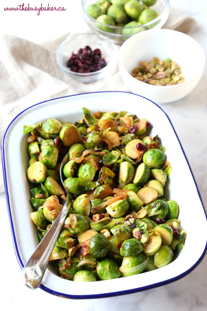 These Brussels Sprouts with Caramelized Onions, Cranberries and Pistachios make the perfect holiday side dish recipe! They're sweet and full of flavour, and they're a colourful, healthy choice! Recipe from thebusybaker.ca! #healthysidedish #healthyholidayrecipe #healthychristmas #christmassidedish #brusselssprouts #healthybrusselssprouts