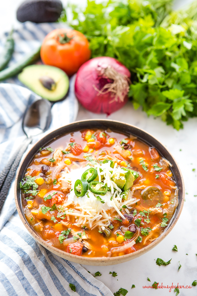 Mexican tortilla soup with sour cream and jalapenos