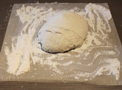forming a loaf of no knead bread