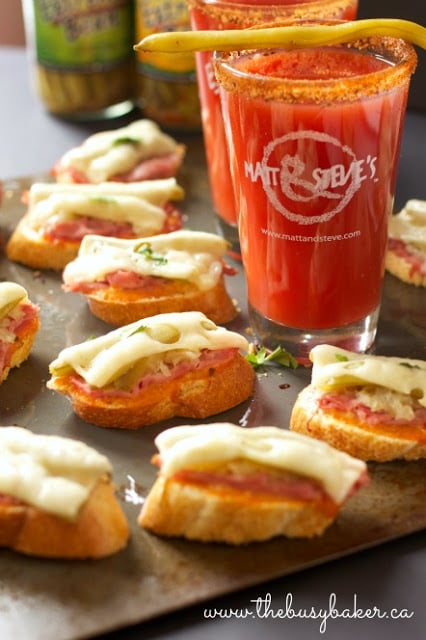 Mini Reuben Sandwich Appetizers next to a Bloody Mary cocktail