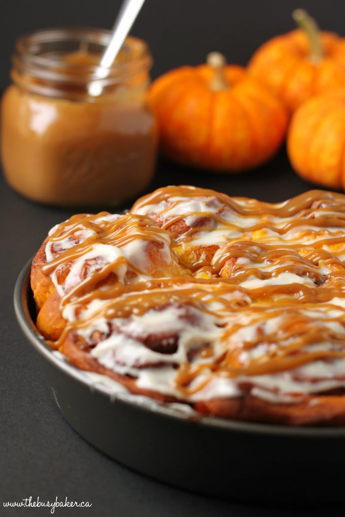 pumpkin cinnamon rolls in a pan