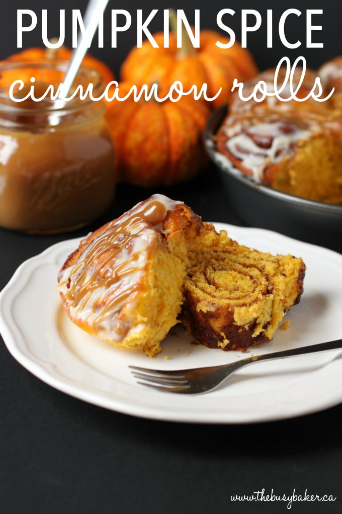 These soft and moist Pumpkin Spice Cinnamon Rolls are the perfect fall treat made with real pumpkin, fragrant spices and an easy cream cheese glaze! Recipe from thebusybaker.ca! #PumpkinSpice