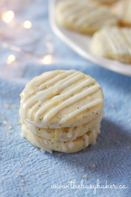 top down view of Earl Grey cookies with lemon glaze stacked on top of one another