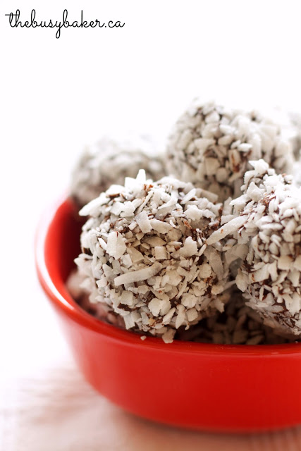 close up image of chocolate peppermint truffles coated with coconut