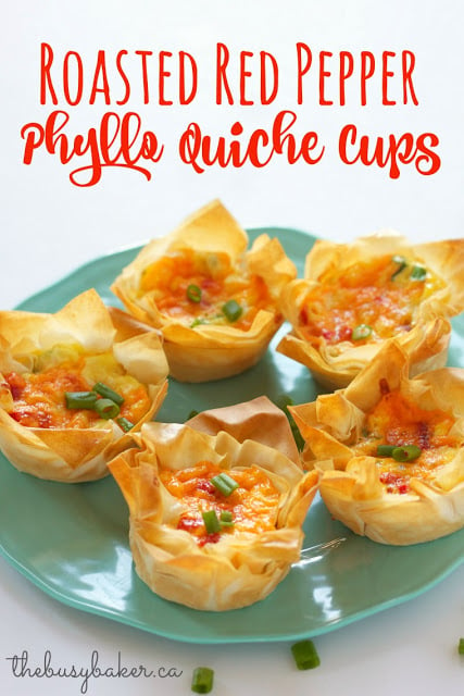 titled photo (and shown): Roasted Red Pepper Phyllo Quiche Cups (on a green plate)