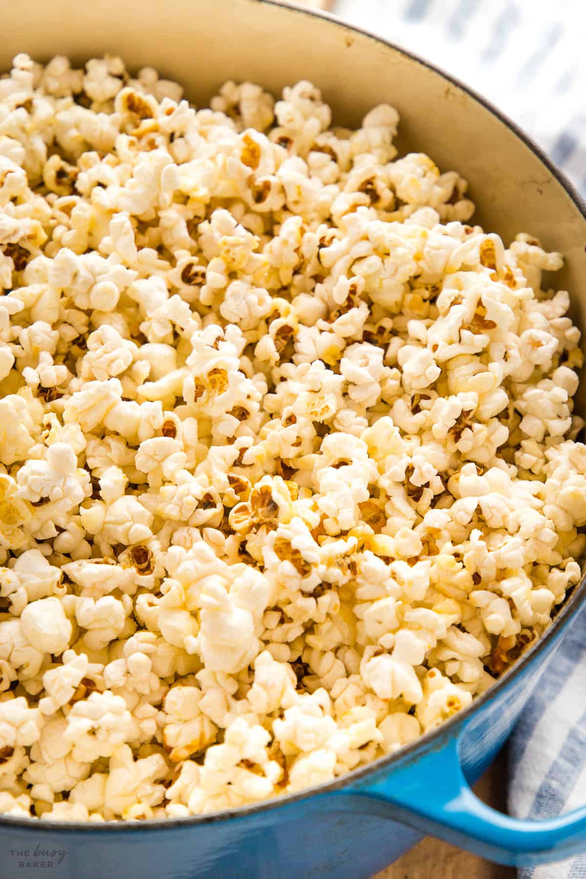 popcorn in a blue dutch oven pot