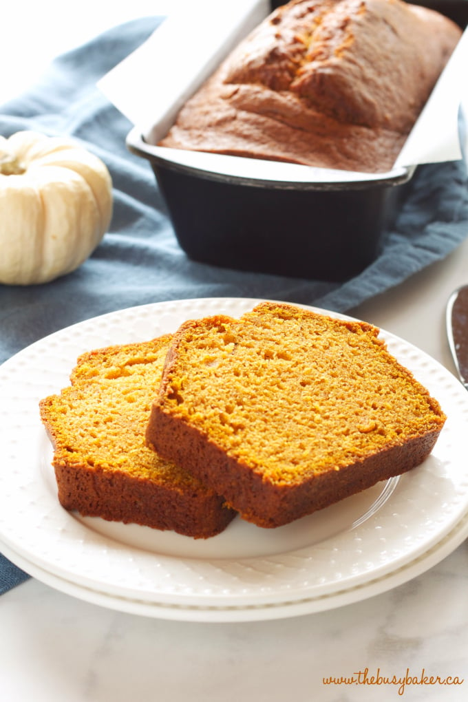 two slices of pumpkin bread in forefront