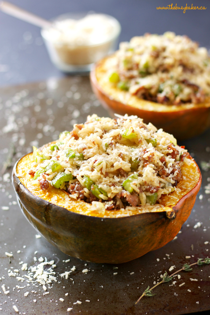 This Italian Sausage and Brown Rice Stuffed Acorn Squash is a deliciously healthy easy weeknight meal idea made with sausage, whole grain rice, and seasonal veggies! Recipe from thebusybaker.ca! #stuffedacornsquash #italiansausagestuffed #easyweeknightmeal