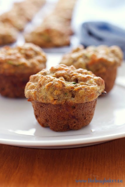 These Healthy Toddler Friendly Mini Muffins are a great snack for kids, sweetened only with fruit and full of vegetables and whole grains! thebusybaker.ca