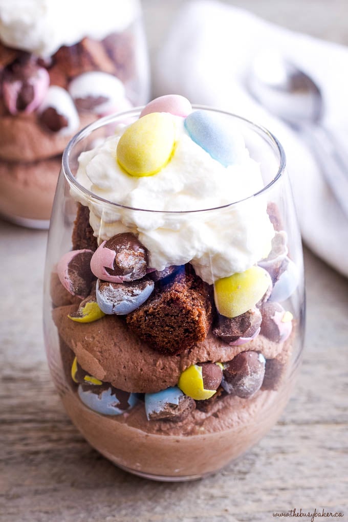 candy coated easter eggs in a dessert parfait with brownies