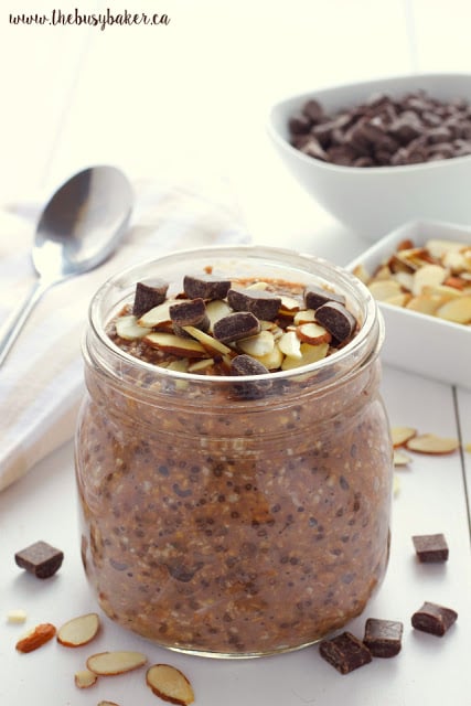 individual jar of overnight oats with chocolate, chia seeds and almonds