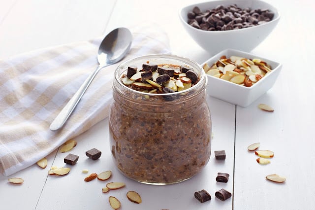 mason jar filled with almond chocolate overnight oatmeal