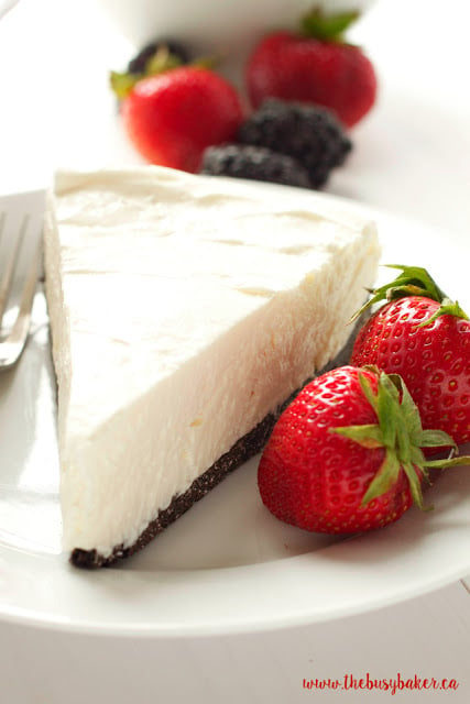 This Classic No Bake Cheesecake is so creamy and delicious and it's made with only 3 ingredients!! It's the perfect easy dessert that you don't have to bake! Serve it with fresh berries for an easy summer treat or add whatever toppings you like and enjoy it any time of the year! Recipe from thebusybaker.ca! #summerdessert #bestevernobakecheesecake