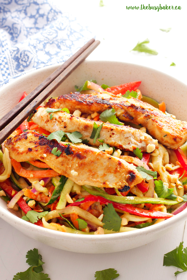 This Thai Chicken Spiralized Zucchini Salad is a healthy Asian-inspired meal featuring grilled chicken breast, spiralized veggies, and an easy peanut sauce! Recipe from www.thebusybaker.ca