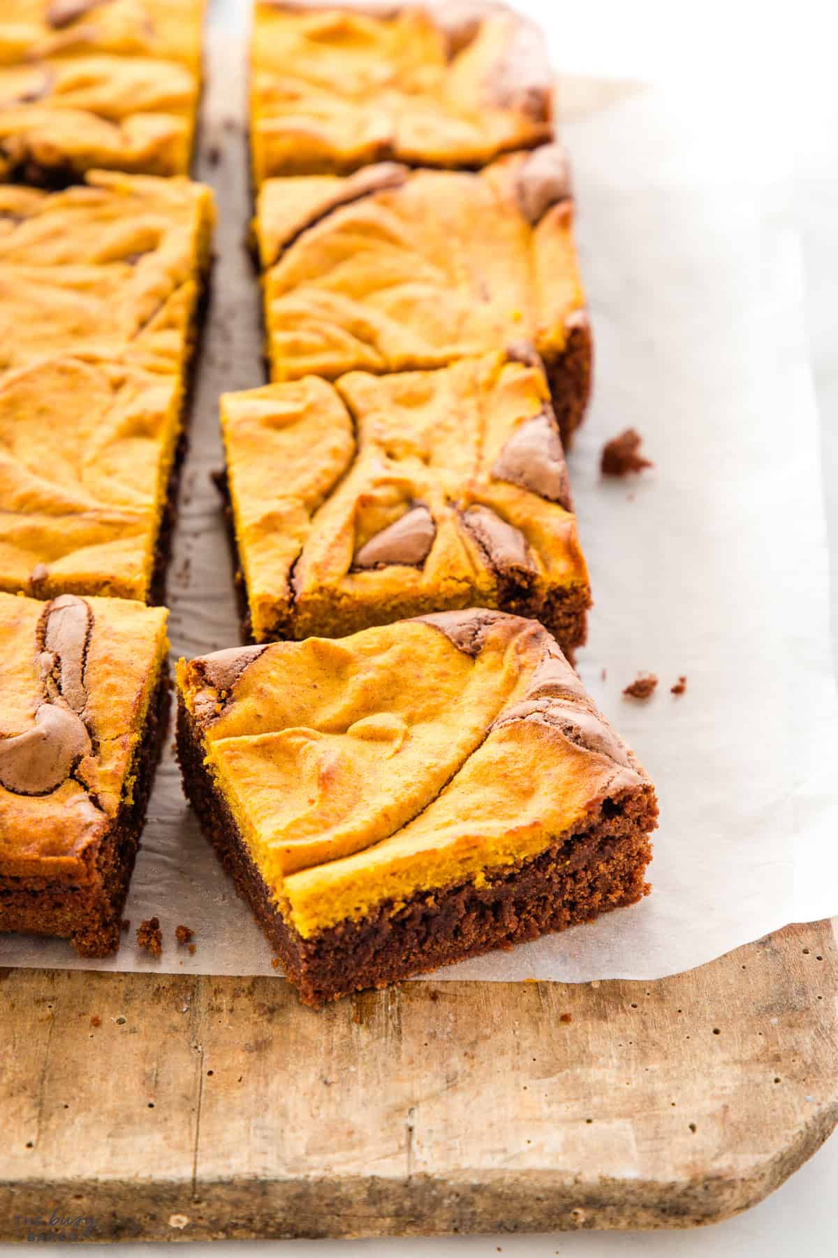 fudgy homemade brownies with pumpkin swirl topping