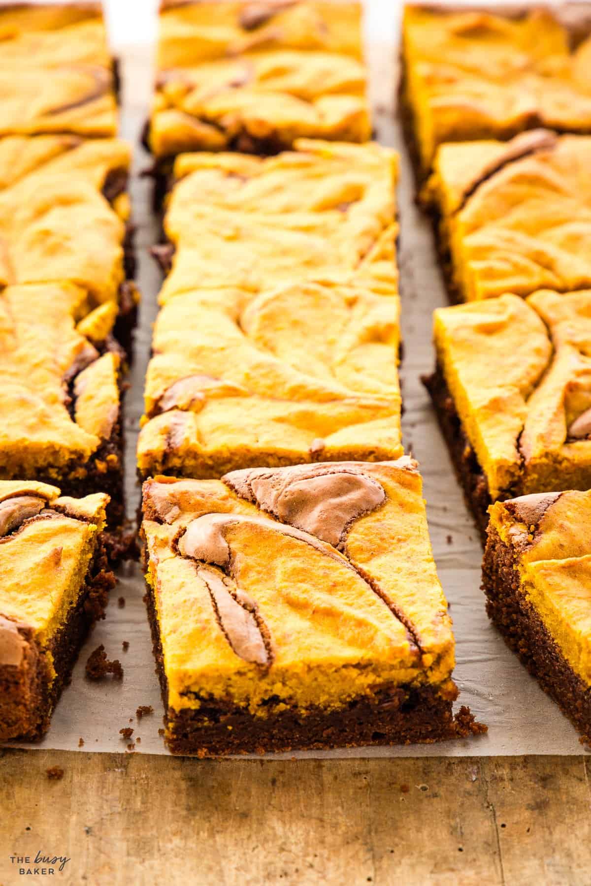 pumpkin swirl brownies on a serving board