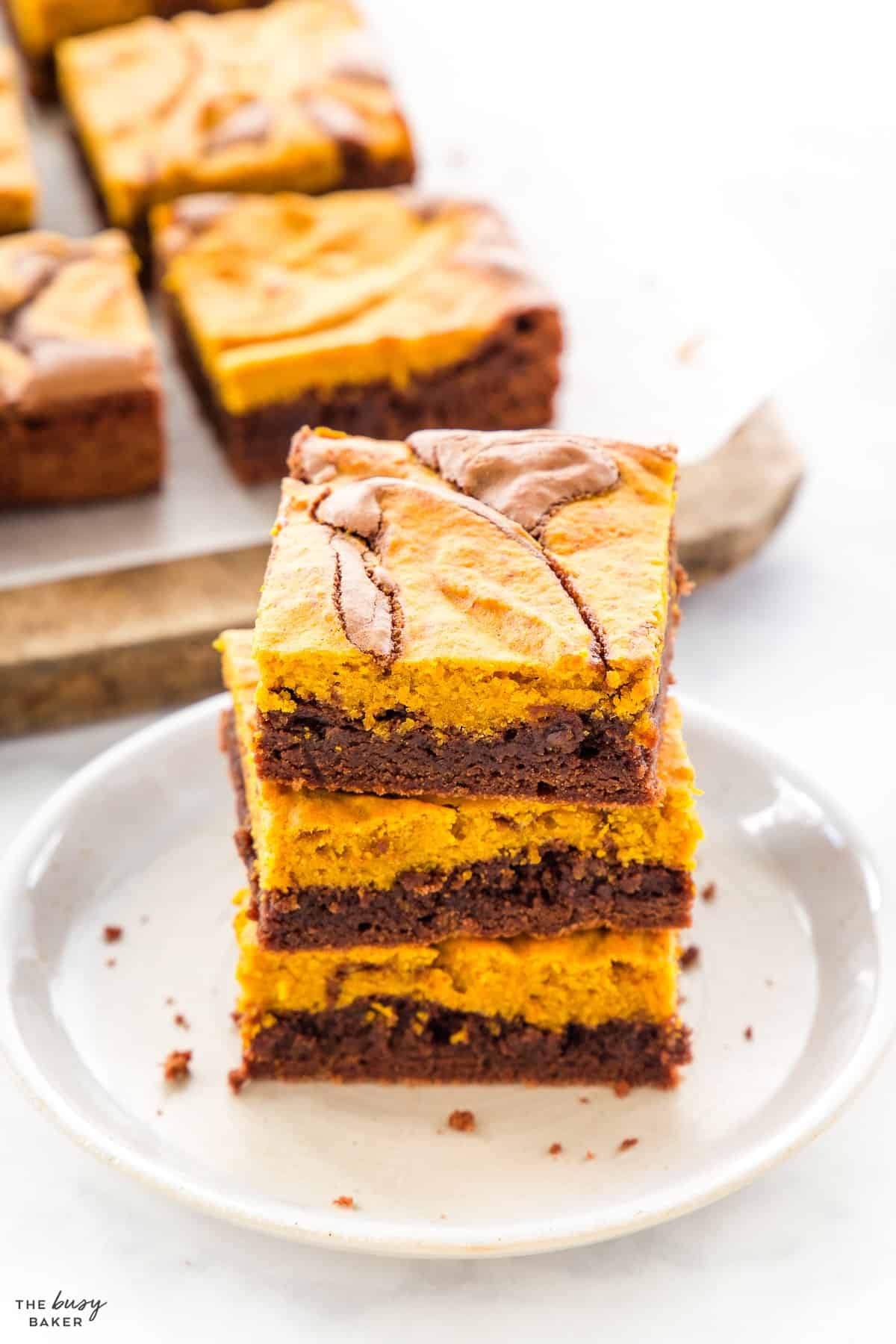 stack of pumpkin brownies on a plate