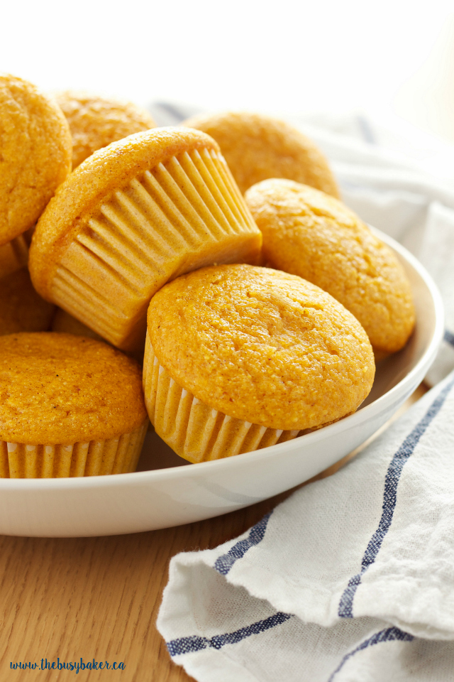 These Healthy Pumpkin Cornbread Muffins make a delicious easy to make snack, but they're best served alongside your favourite soup, stew or chili! Recipe from thebusybaker.ca!
