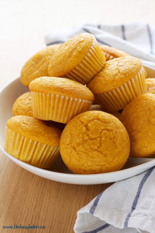 These Healthy Pumpkin Cornbread Muffins make a delicious easy to make snack, but they're best served alongside your favourite soup, stew or chili! Recipe from thebusybaker.ca!