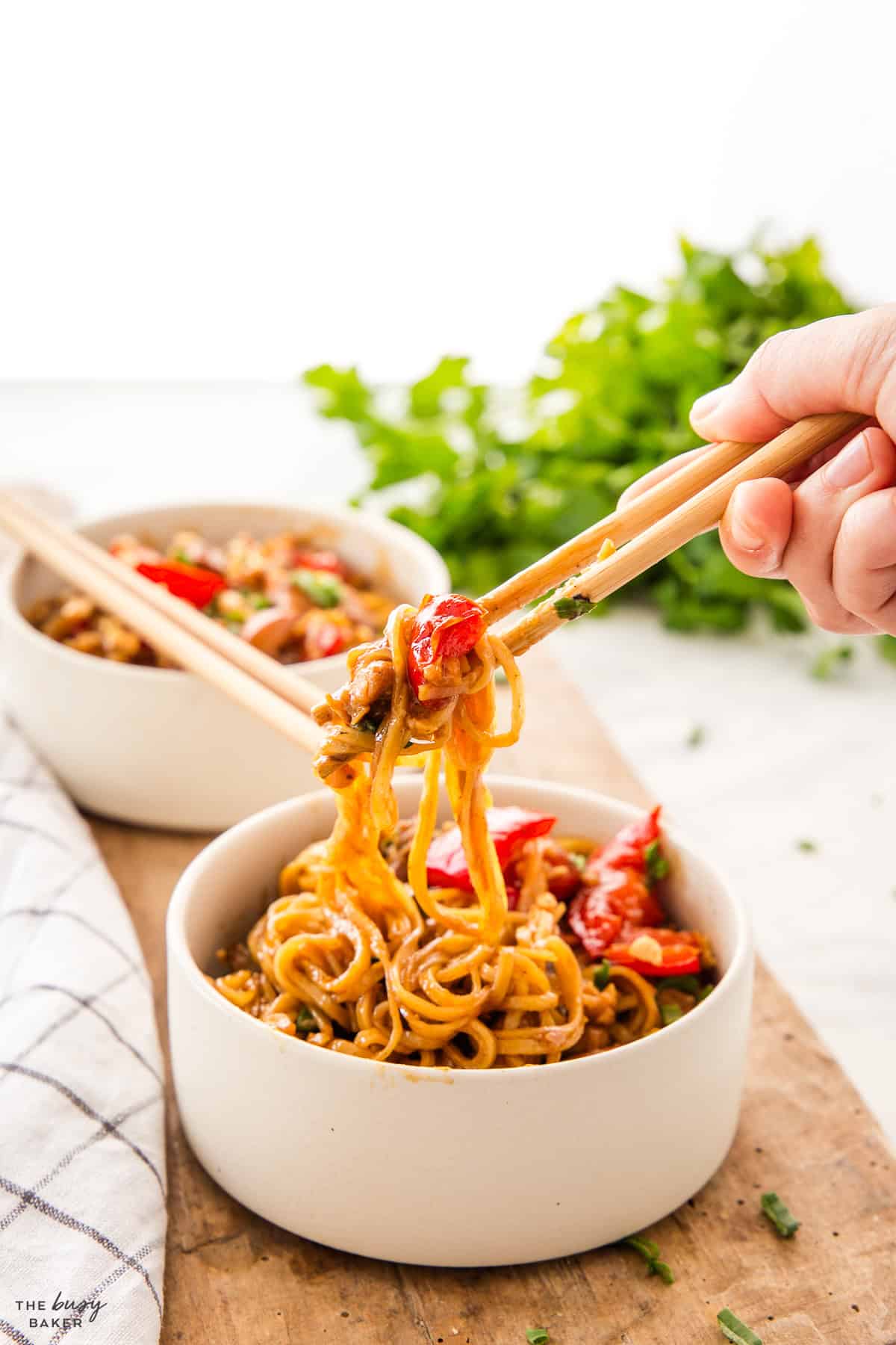 kung pao chicken with noodles with chopsticks