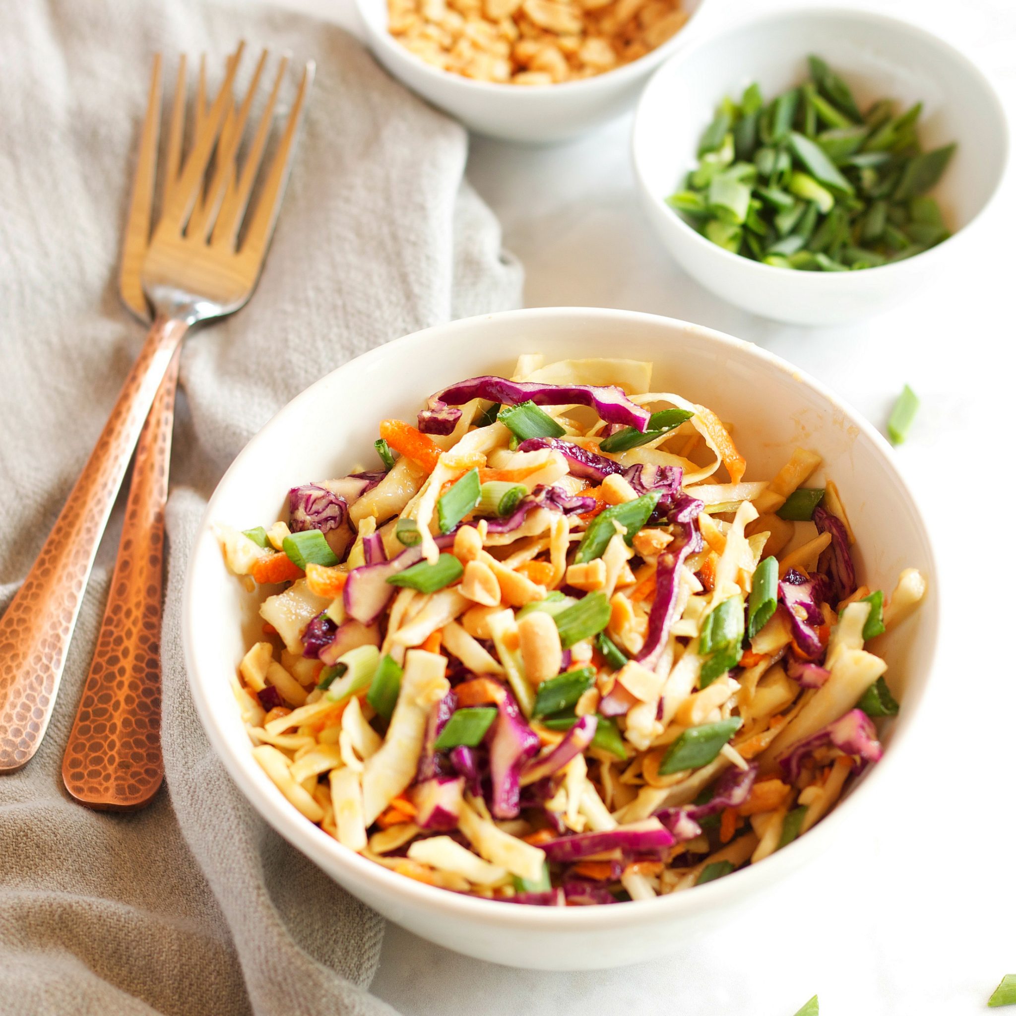 This Asian Cabbage Salad with Ginger Peanut Dressing is a delicious and light Thai-inspired side dish! Recipe from thebusybaker.ca!