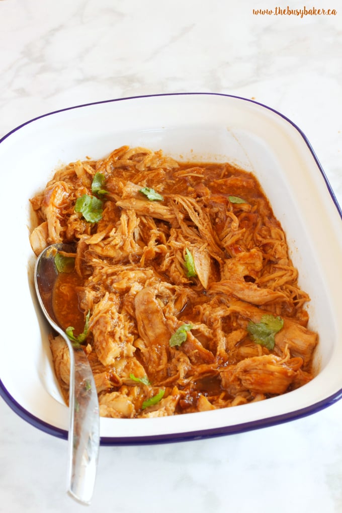 These Easy Slow Cooker Barbecue Pulled Pork Sandwiches feature a super easy 3-ingredient Slow Cooker Pulled Pork with an easy homemade coleslaw! Recipe from thebusybaker.ca!