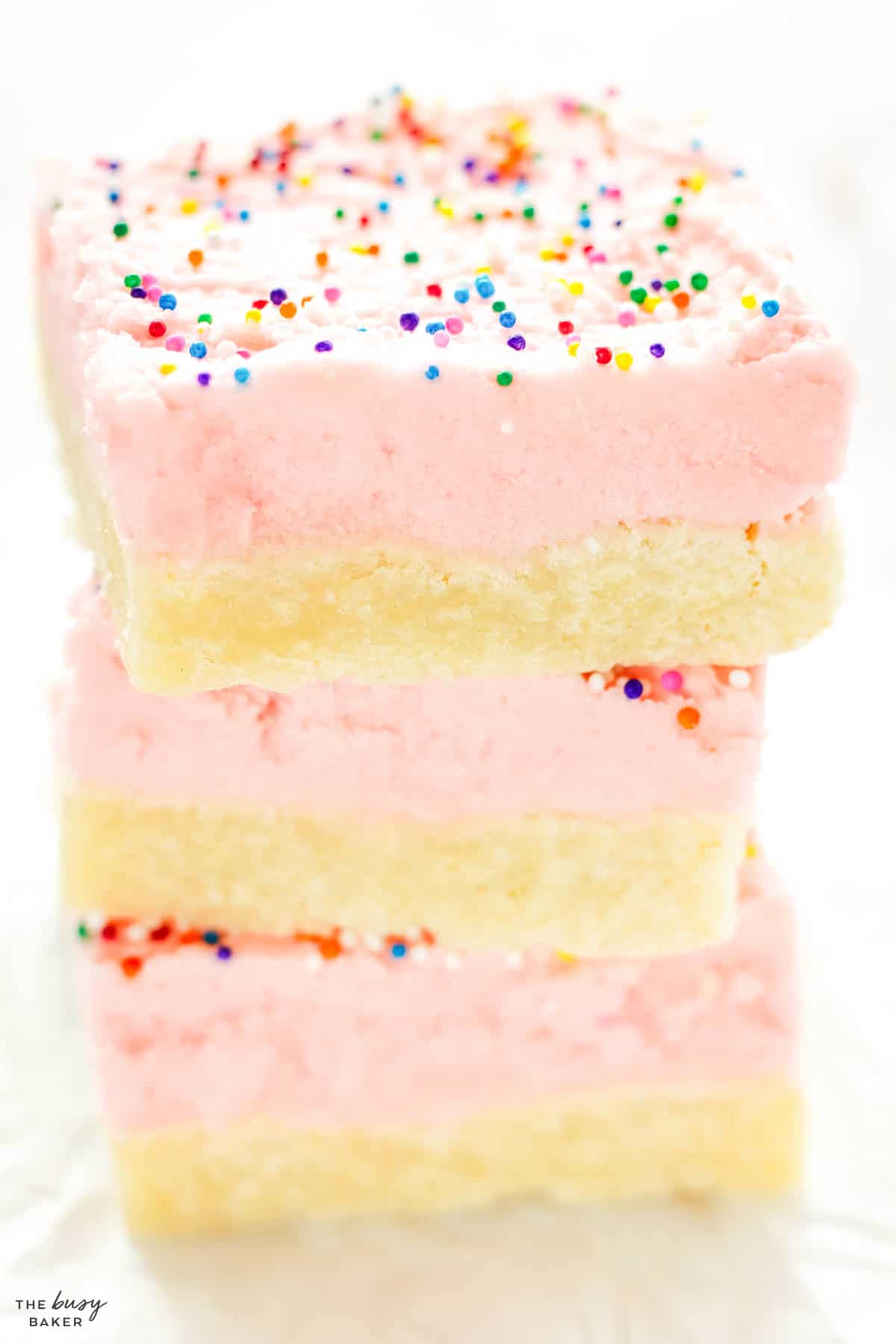 frosted sugar cookie bars in a stack
