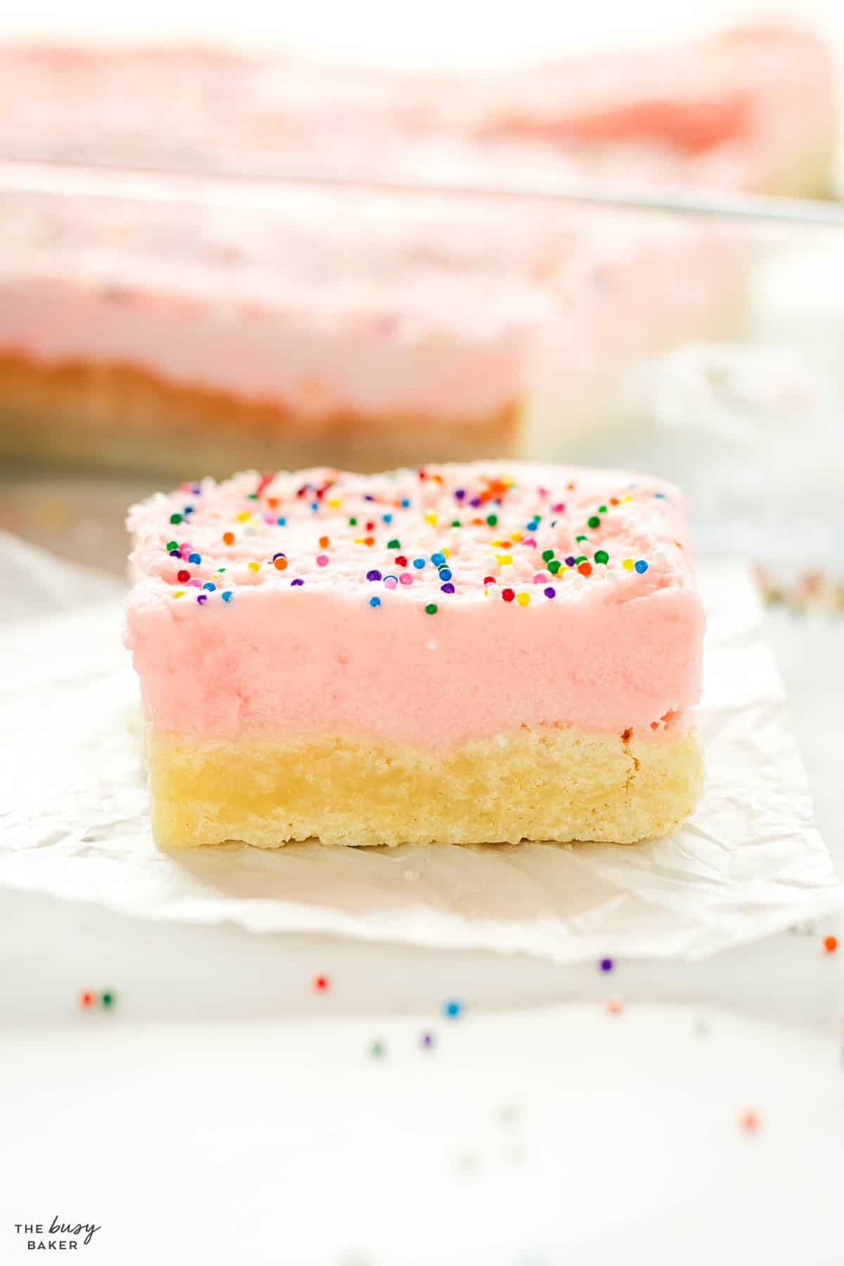 sugar cookie bar with frosting and sprinkles