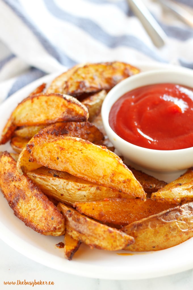 These Crispy Barbecue Potato Wedges are the perfect summer side dish - crispy on the outside and soft on the inside, with deliciously smoky BBQ flavor! Recipe from thebusybaker.ca!