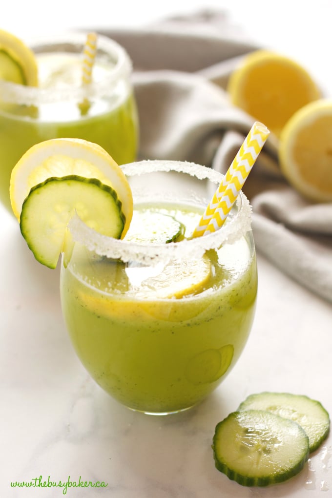 lemonade made with cucumber garnished with slices on cucumber and lemon slices