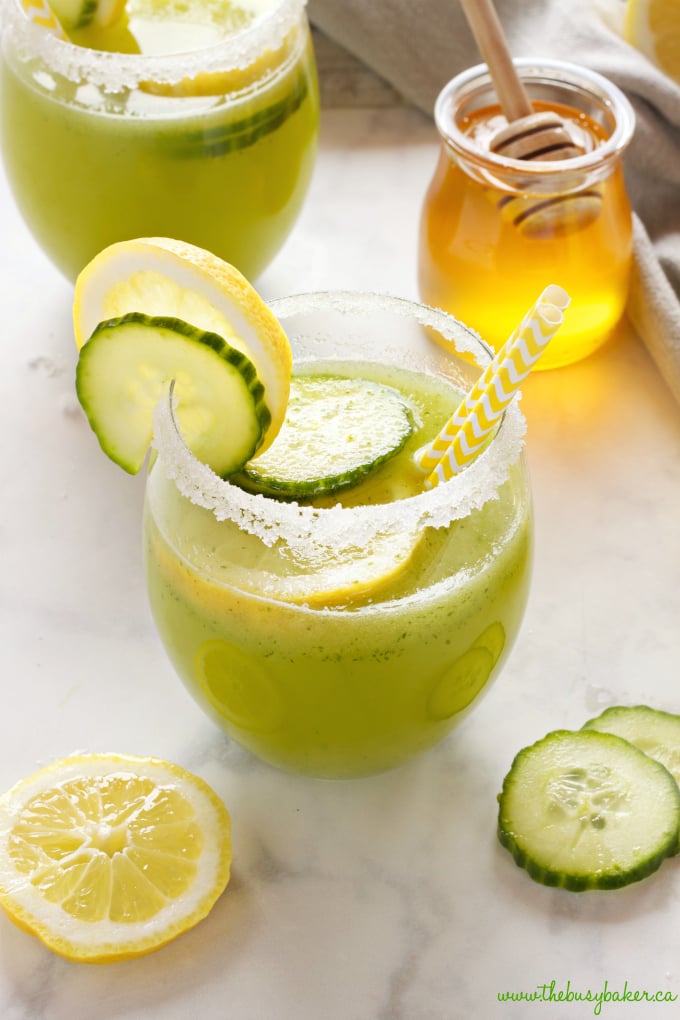 Cucumber lemonade in a glass with cucumber and lemon slices 