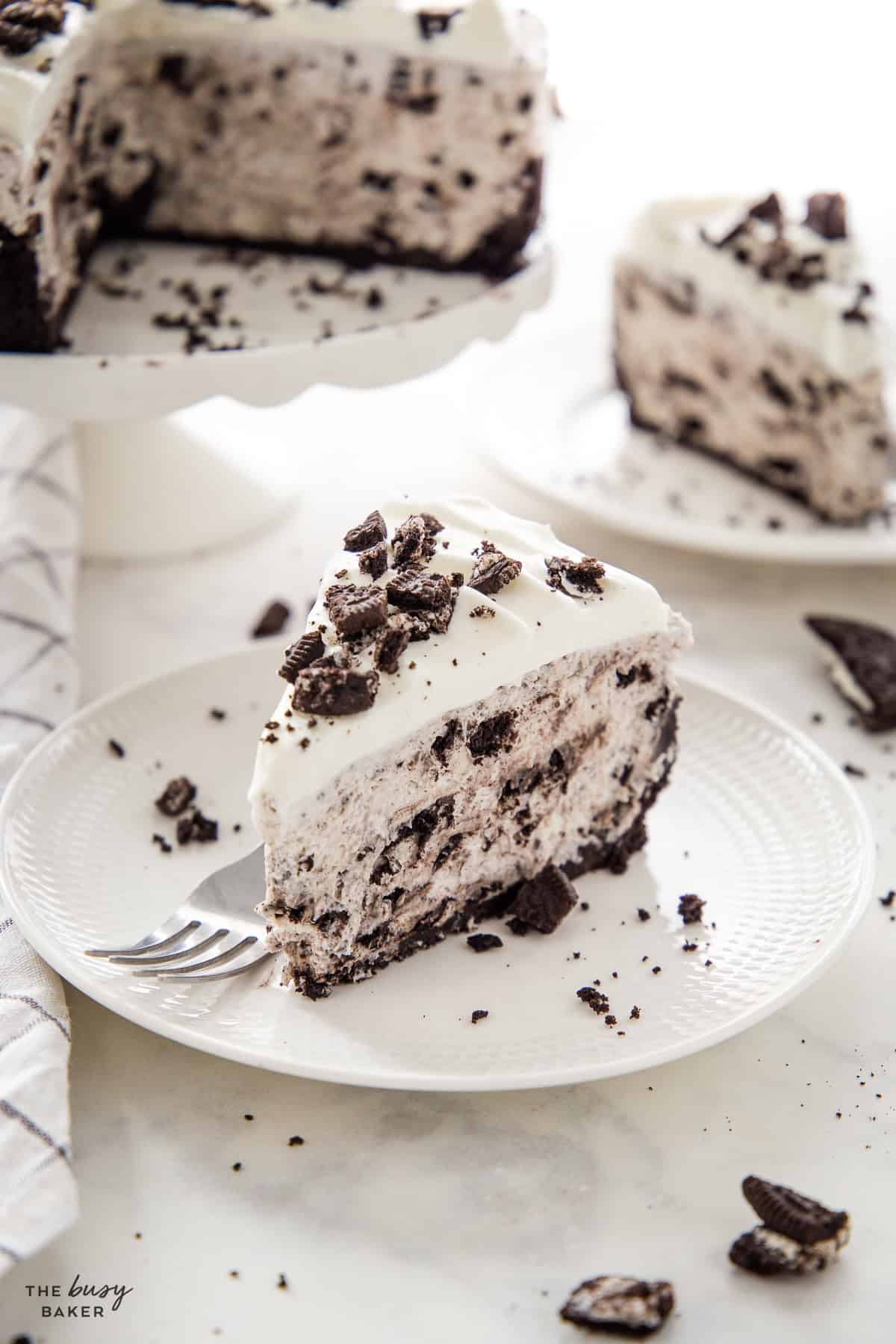 slice of no bake oreo cheesecake on a plate with a fork