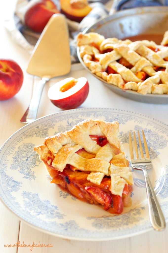 This Easy Classic Peach Pie recipe is simple and rustic, made with a butter crust and fresh peaches. Recipe includes my pro tips for the perfect pie every time! www.thebusybaker.ca